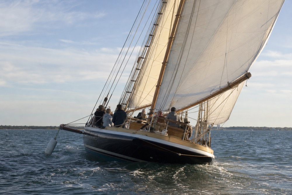 An 84-foot schooner under sail on open water near Charleston, no text, no logos, no people