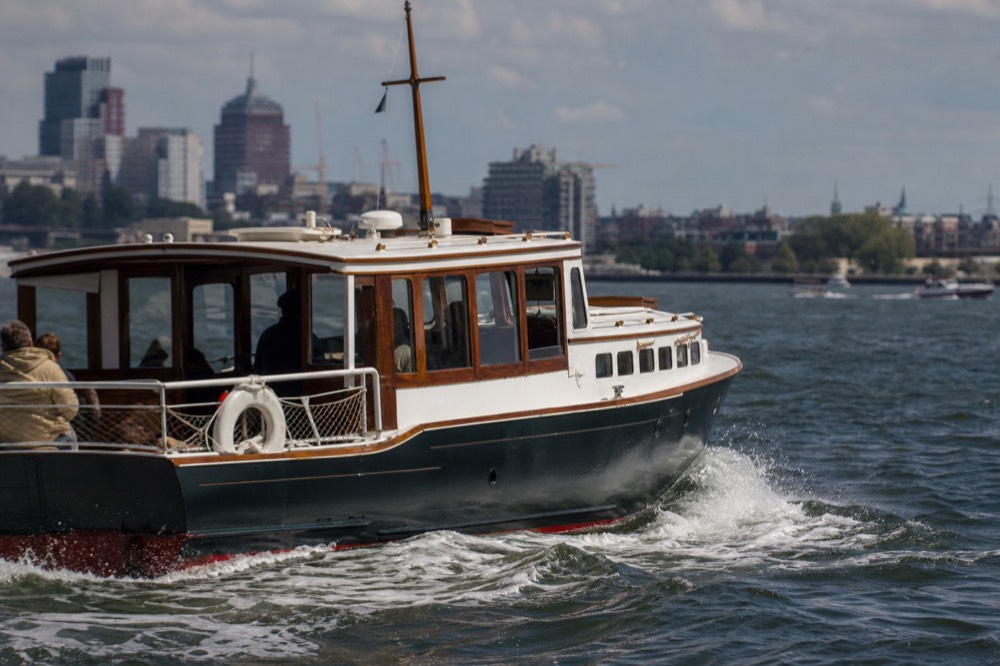 A classic excursion boat underway in Charleston Harbor, no text, no logos, no people